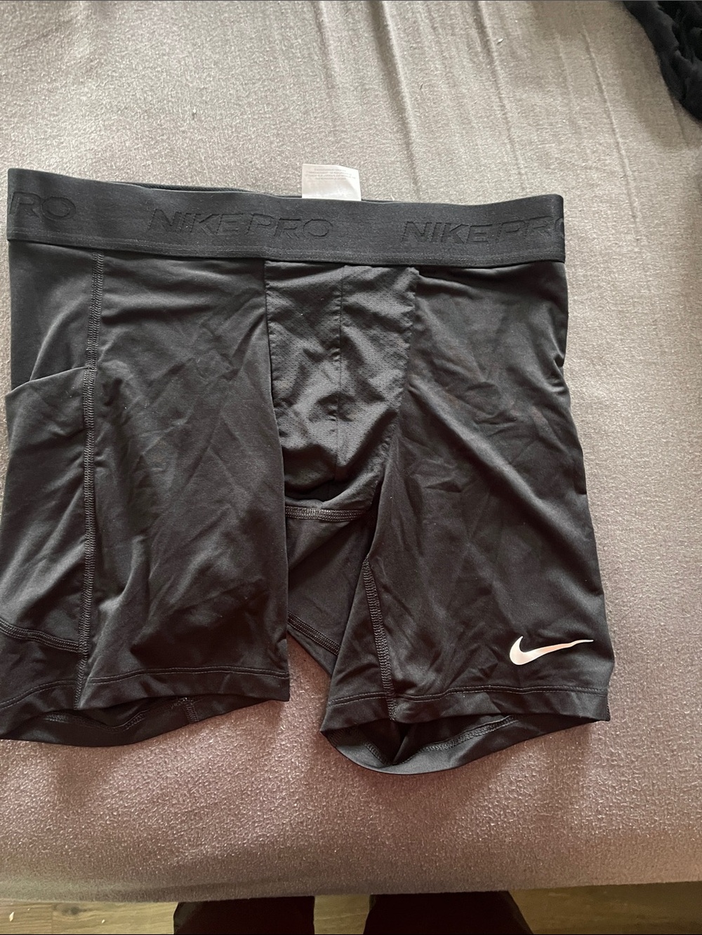 Nike Black Compression Shorts with White Swoosh